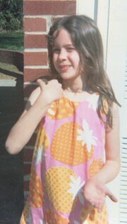 Thumbnail for File:Jenny in strawberry dress with Charlie.web.jpg