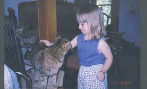 1997-05-17-01a Anna and cat.adj.800pxh.jpg
