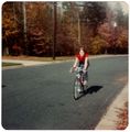 1978-fall Sandy riding a bike - straight.adj.jpg